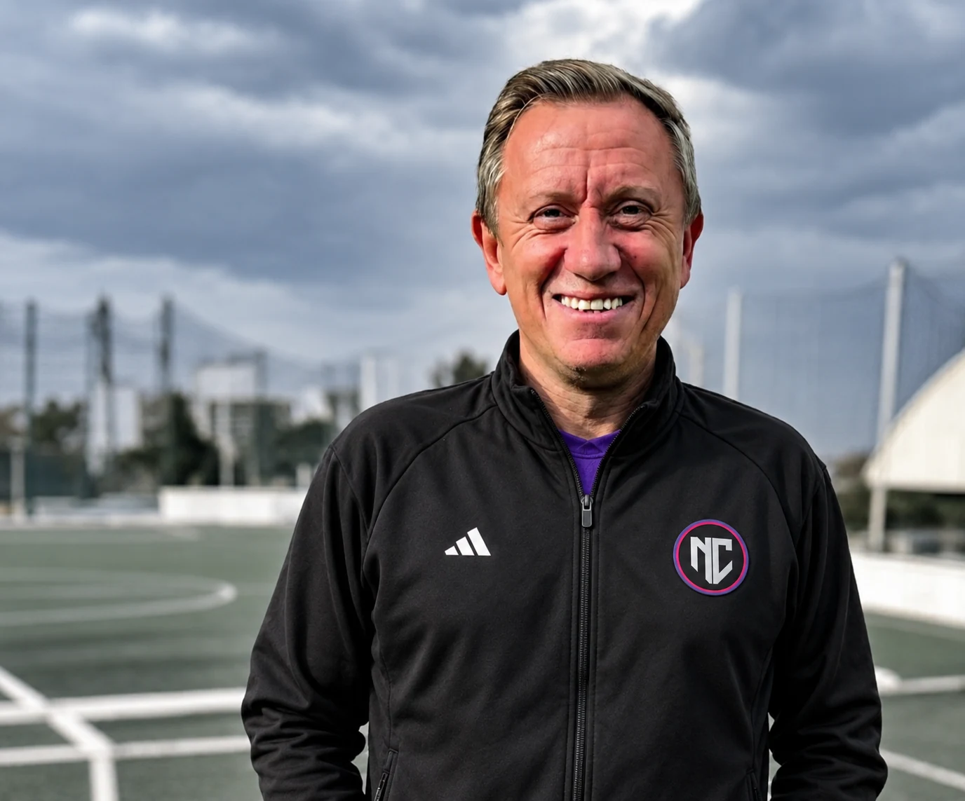 Neil Connor in updated black Adidas Coach NC coaching kit